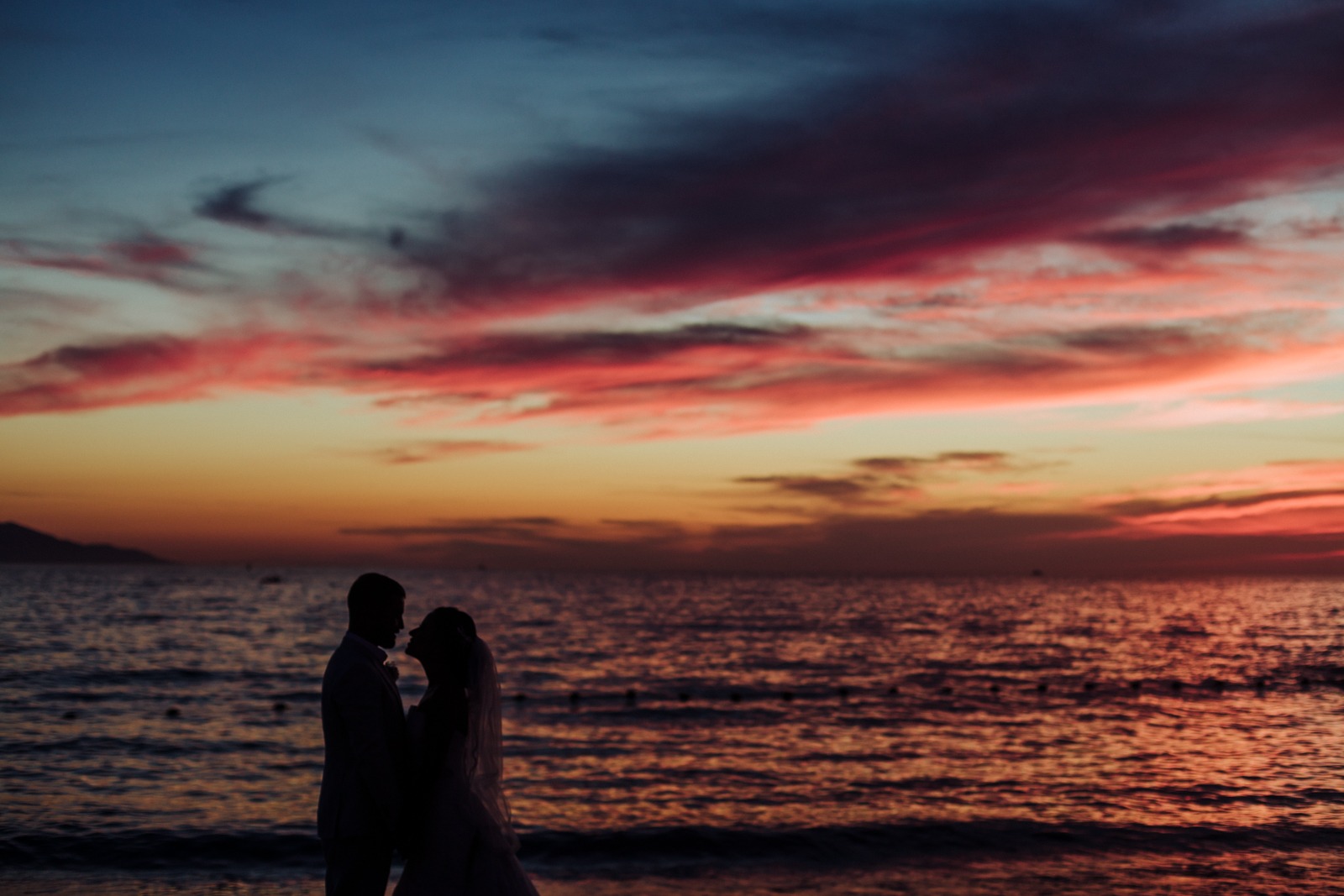 bride-groom-silouette-ocean-sky-sunset-red-sky-wave