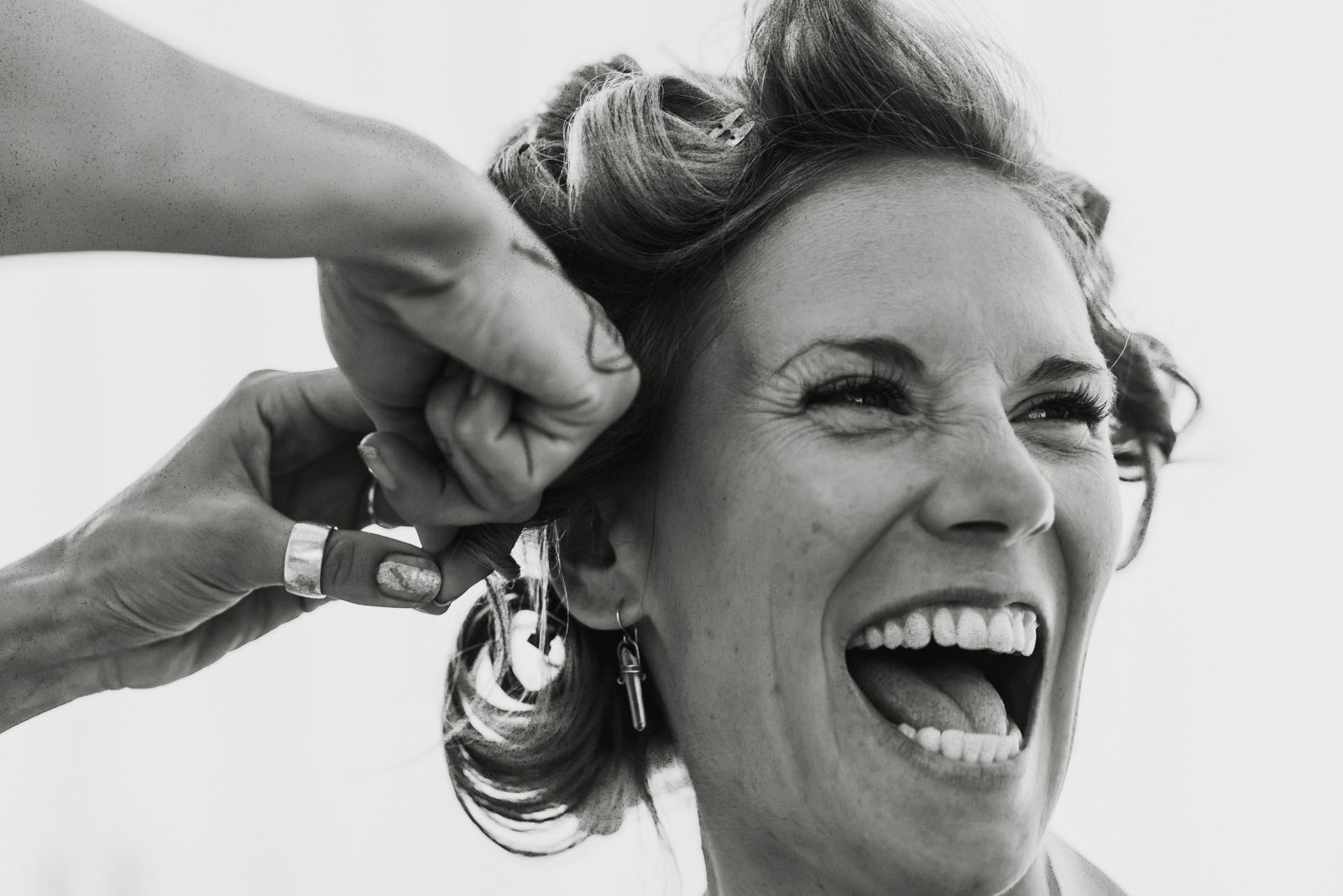 bride-smile-moment-gettin-ready-hair-hands-vallarta-wedding