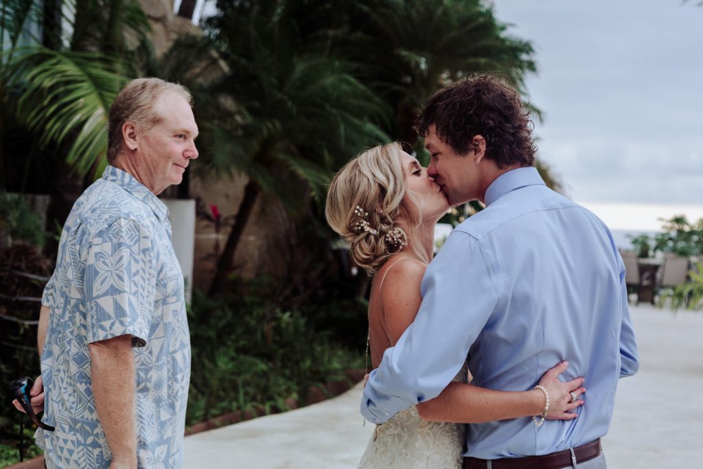 wedding Vallarta mismaloya bride groom kiss dad look 