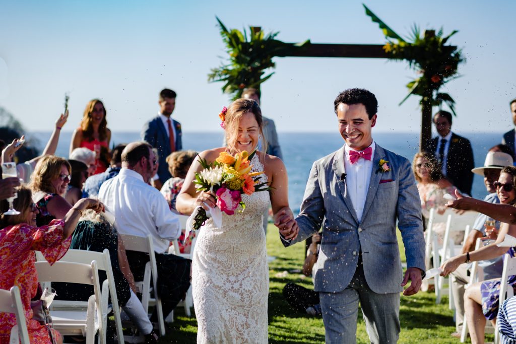 bride and groom walk as wife and husband for the first time