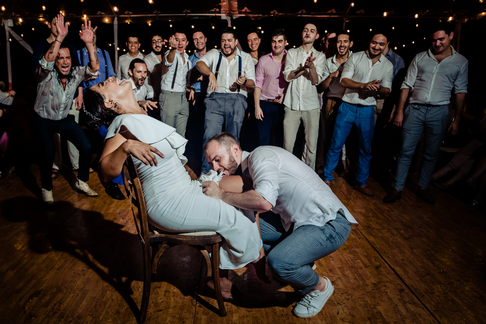 wedding garter tit moment fu with all the boys, bride smile