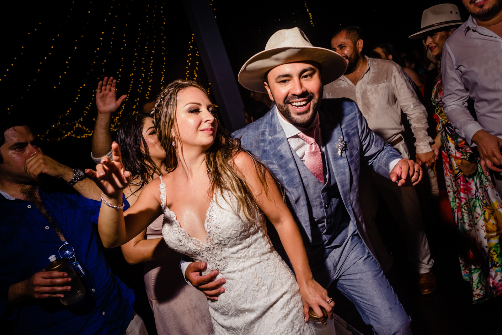 bride and groom dance on the party