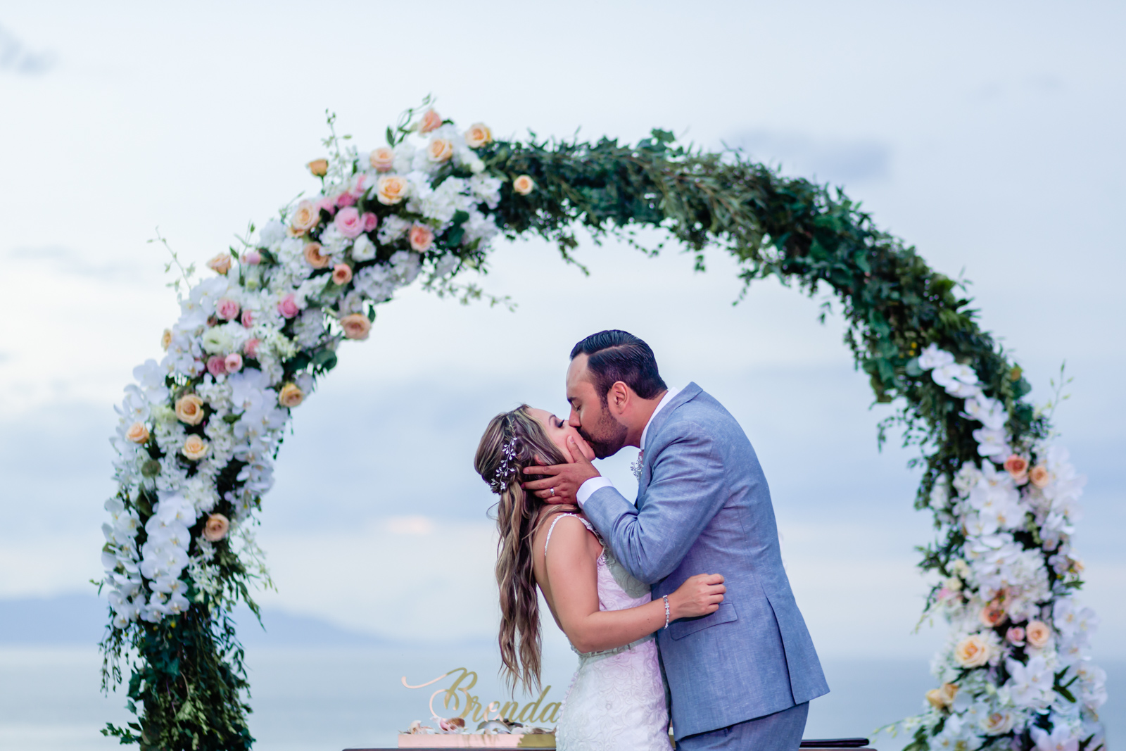 bride and groom kiss at the end of the ceremony