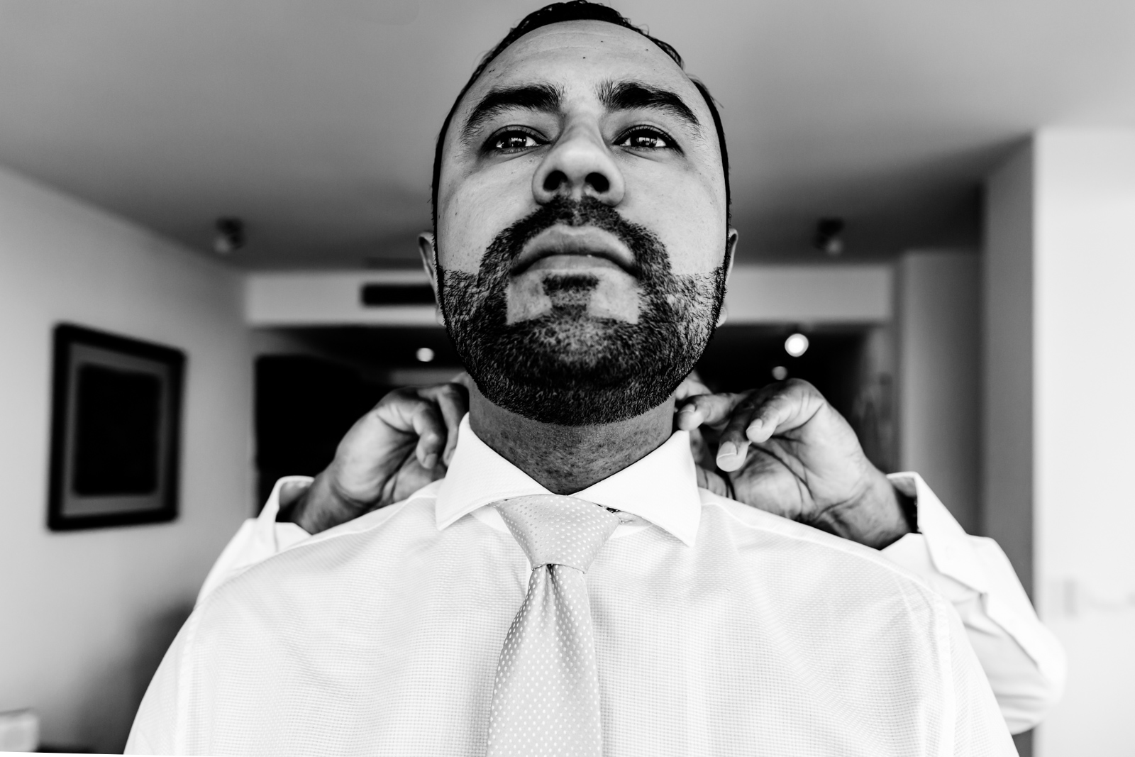 groom gettin ready, tie fixed by his dad