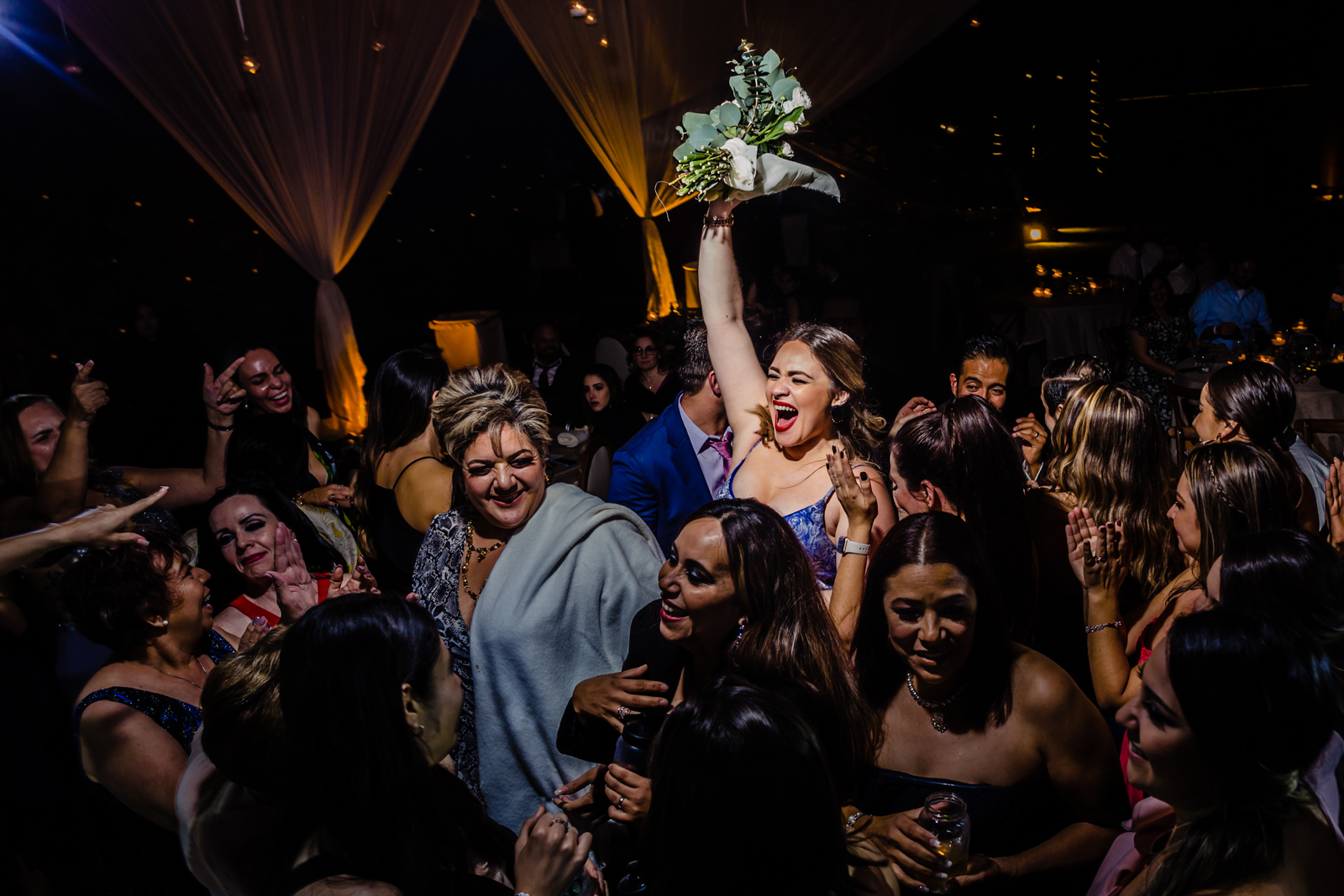 wedding bouquet during the party, friend grab and smile 