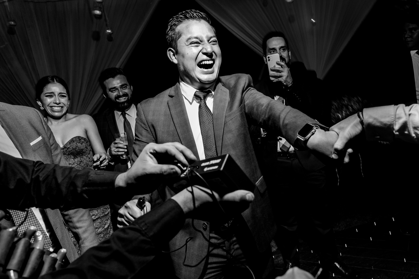 wedding party, guy play with the electric machine and having fun 