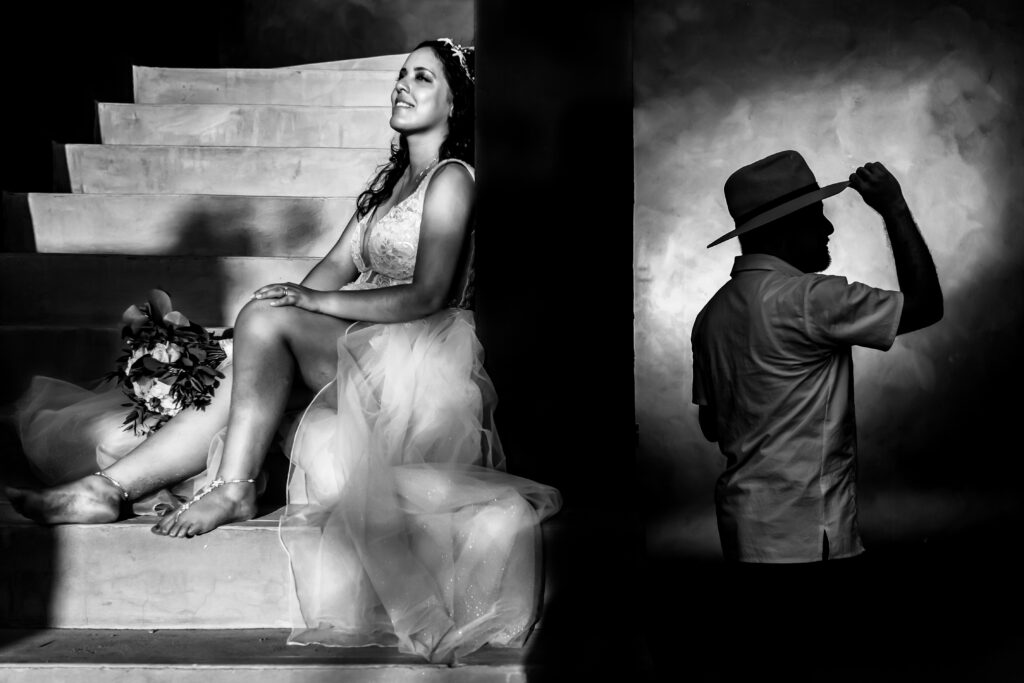 bride sit on a stair with the groom on a silueta during trash the dress